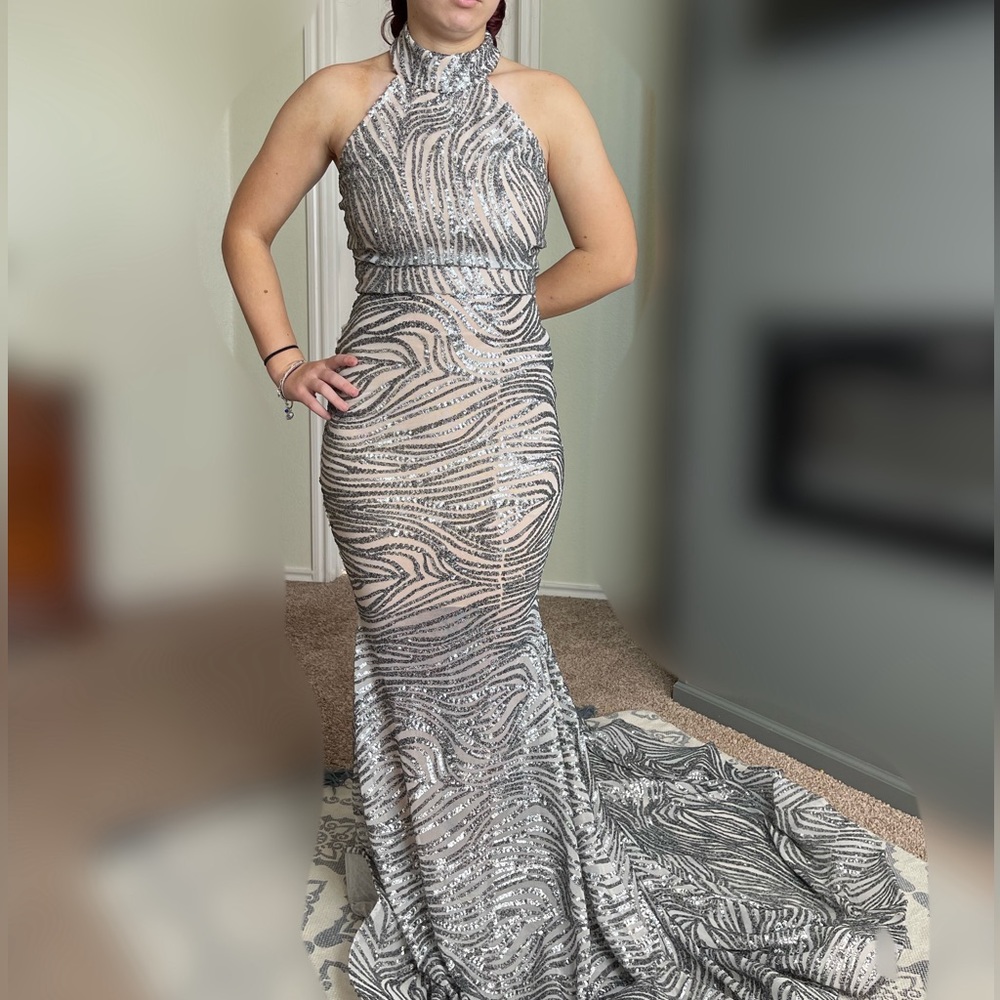 Walter Mendez silver sequined mermaid tail ball gown.